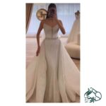 Masoumeh Ali Khanzadeh's Stunning Bridal Dress Featuring Lace and Tulle Layers
