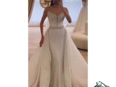 Masoumeh Ali Khanzadeh's Stunning Bridal Dress Featuring Lace and Tulle Layers