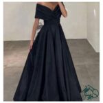 Masoumeh Ali Khanzadeh's Sophisticated Off-Shoulder Evening Dress in Deep Blue