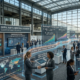 Global exhibitor authority transformation showing journey from exhibitor to industry authority with five strategic frameworks and five authority systems over seven-year roadmap